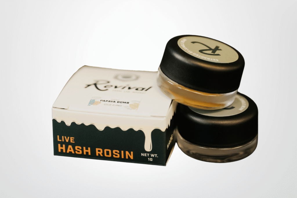 Revival: Farm.Lab.Market Live Hash Rosin, solventless, cold-cured cannabis concentrate in Papaya Bomb strain, featuring branded packaging and glass jars.